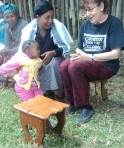 SW with SHG woman and child